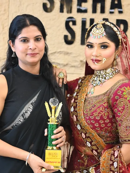 The runner-up with her beautifully created bridal model. A testament to her skill and learning.