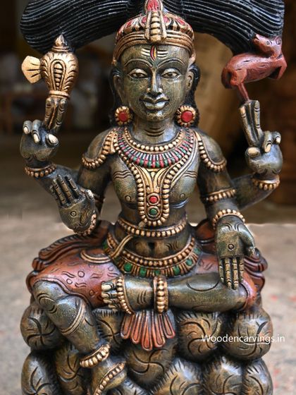 A close-up of the face and torso of the 25.5-inch Mahadev statue, highlighting the hand-painted details.