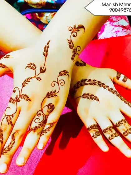 A delicate vine pattern that gracefully flows from the wrist to the fingers. This is a perfect choice for someone who wants a light and elegant design for a party or festival.