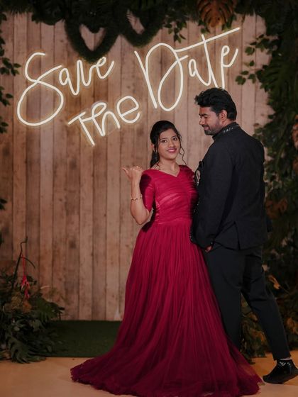 A fun 'Save the Date' photo using our neon sign against a rustic wooden backdrop, perfect for wedding announcements.