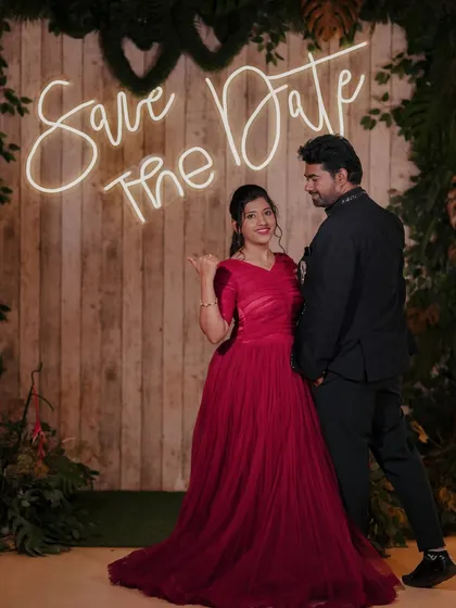 A fun 'Save the Date' photo using our neon sign against a rustic wooden backdrop, perfect for wedding announcements.
