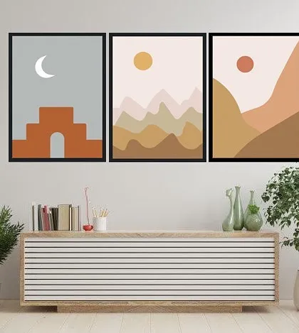 This set of three framed prints creates a beautiful, abstract landscape. Featuring a moon over an arch and two different sun-drenched mountain scenes, this triptych tells a story of day and night in a minimalist style.