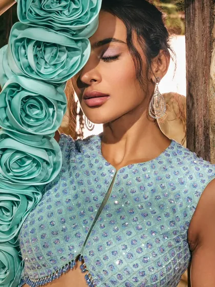 The intricate details of the Moonlit Collection are on full display here. The delicate beadwork and unique design make this a truly special piece.