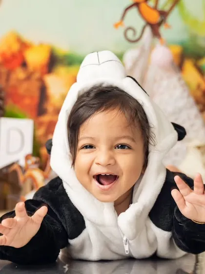 This is the face of a happy 'Wild One'. We live for these candid, joyful expressions that can't be posed or planned, capturing the true spirit of your child.