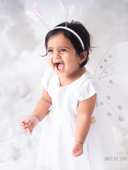 A burst of pure, unfiltered joy. This is the kind of reaction I aim for in every session, a moment of happiness frozen in time.
