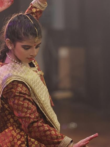 A close-up of one of our young dancers, focused and poised during her performance at Varshik Utsav 2024. The discipline and dedication of our students are at the heart of our parampara.