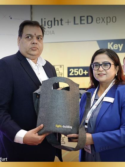 A moment of appreciation as a guest is honored during the felicitation ceremony.