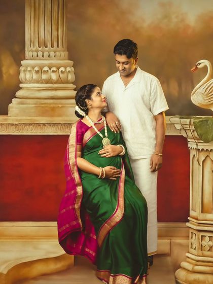 A sweet moment of connection between a couple, seated together in a setting that feels both grand and intimate.