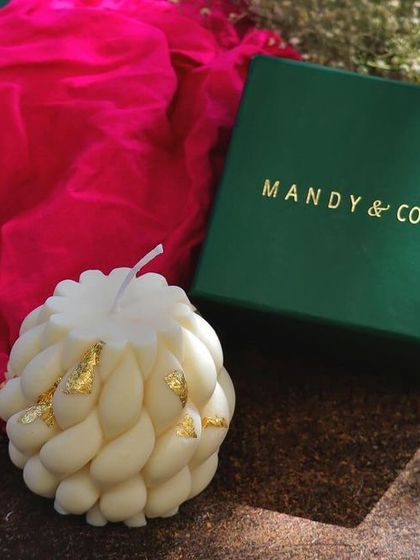 My luxury braided soy candle, finished with gold foil and presented in a premium gift box. This piece is designed to look festive and clean, making it a sophisticated gift.