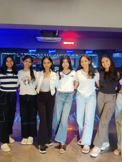 A group of girls posing for a photo at our gaming arena.