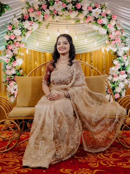 A full view of the engagement setup and the bride looking radiant and happy.