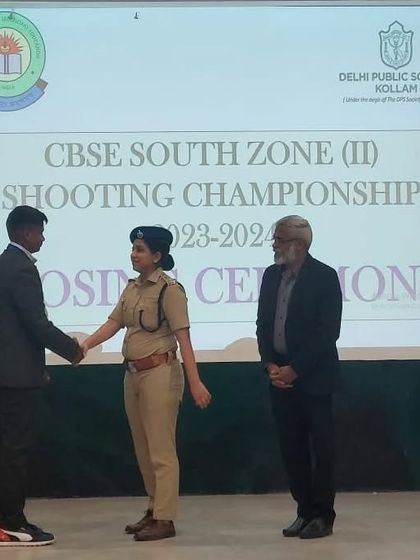 Jonathan receiving his award at the closing ceremony of the CBSE South Zone Shooting Championship.