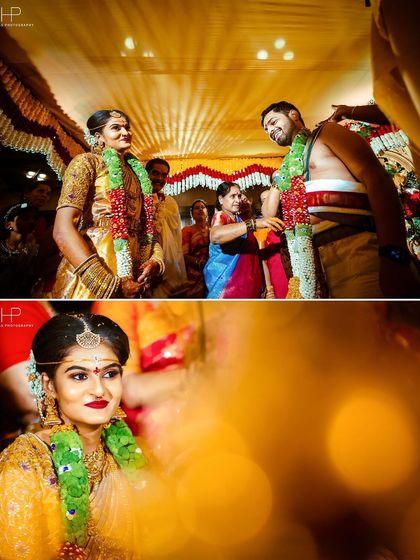 The bride and groom exchanging glances during the Varmala ceremony, a moment just for them.