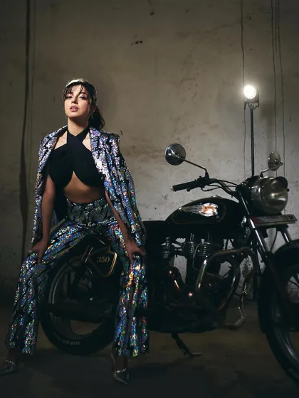 This series of shots captures the full biker-chic look I created for Divya Khosla Kumar's 'Yaariyan 2' promotions. The sequined jacket and pants by Any Old Iron paired with a simple black top created a cool, modern promotional style.