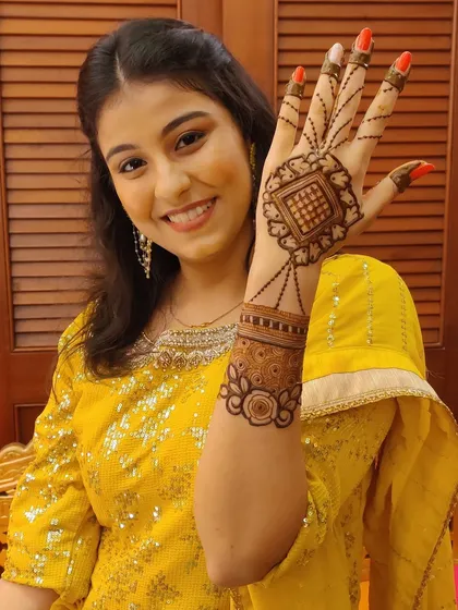 A happy client showing off her beautiful and modern backhand design.