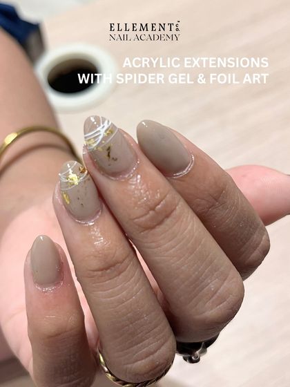 This student work showcases beautiful acrylic extensions with delicate spider gel and foil art. Our courses teach you how to combine different techniques for unique designs.