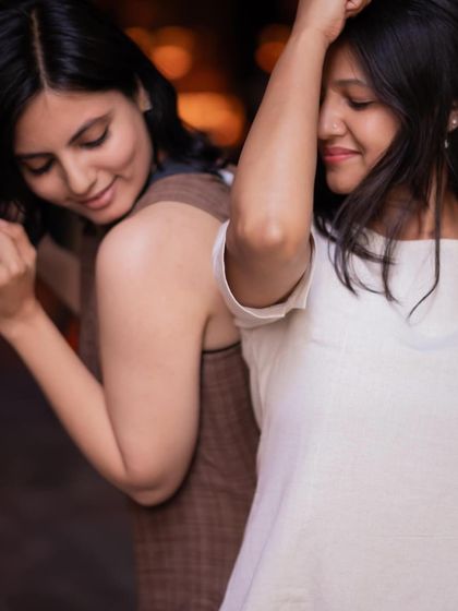 Friends dancing together and enjoying the music. This is what community and nightlife are all about.