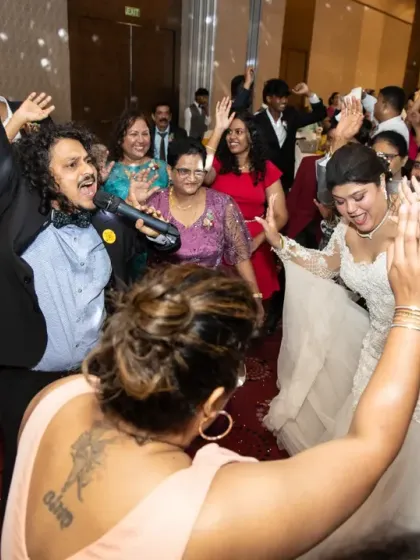 The bride dances with her guests, fully immersed in the celebration. My goal is to capture these moments of connection and joy throughout the reception.