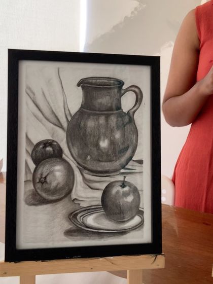 A detailed still life sketch of a pitcher and fruit, demonstrating excellent shading and composition skills.