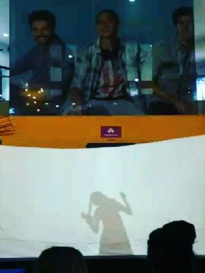 Another angle of the shadow dance sequence from our performance. This technique is effective for creating impactful and artistic stage moments.