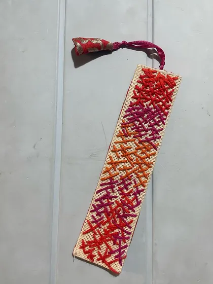 One of my grandson's creations. He called his bookmark "art," and I couldn't agree more. Embroidery is a wonderful way for children to express their creativity.