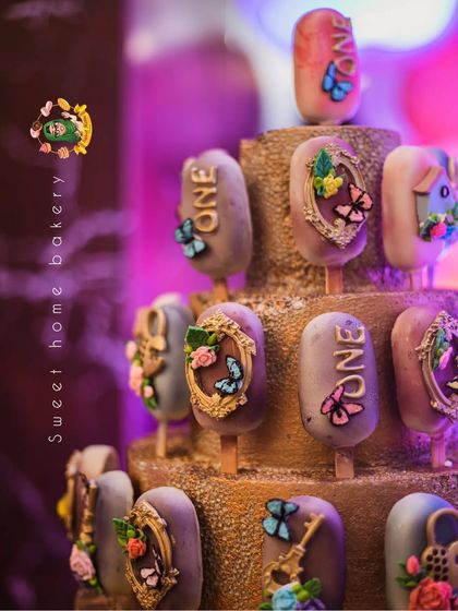 Another angle of the beautiful and intricate cakesicle tower.