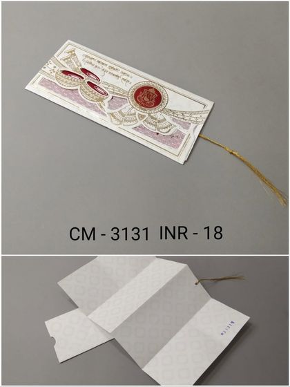 A slim, elegant invitation card with a tie closure. The design features traditional motifs like ceremonial pots (kalash) and has a multi-panel fold-out for text.