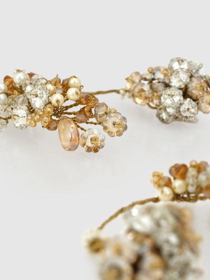 A closer look at the details of our earcuff and stud combination, featuring crystals and pearls.