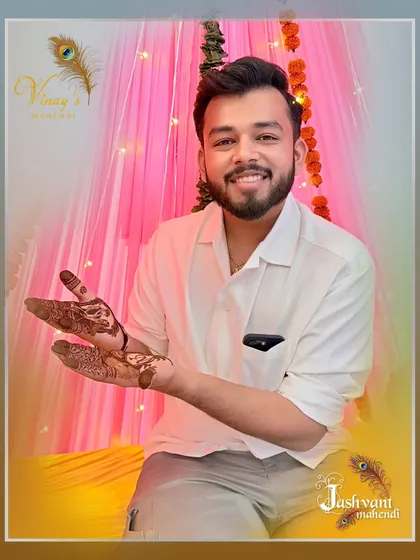 The groom showing the side view of his intricate couple portrait henna.