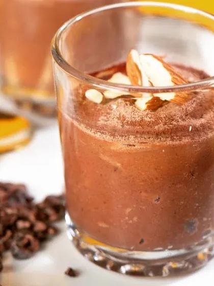 Experience my vegan chocolate mousse, a dessert that proves healthy can be incredibly decadent. It's rich, creamy, and made from a surprising ingredient: sweet potato. Topped with slivered almonds, it's a guilt-free chocolate dream.