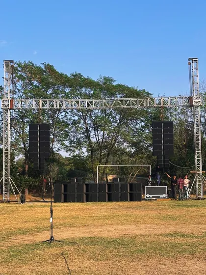 Our L-Acoustics K2 & Kara system being set up for an outdoor event. This photo shows the full rig, including the speaker arrays and subwoofers, demonstrating the professional-grade infrastructure we bring to every production.