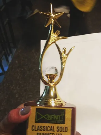 A close-up of our runner-up trophy from the 'Just Dance 2019' competition. This award for 'Classical Solo' represents countless hours of practice and dedication to our art.