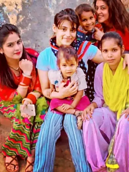 Sharing a moment with women and children. True societal progress is measured by the dignity, security, and respect afforded to its women.