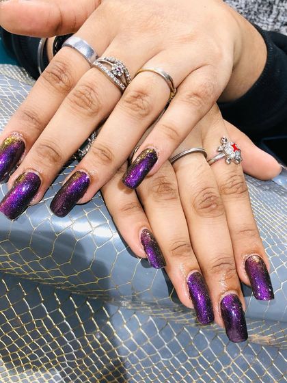 A stunning purple and gold ombre glitter set.