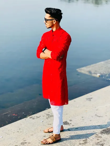 A happy client looking sharp in a custom-stitched red Chikankari kurta. This traditional Lucknowi embroidery adds so much elegance, and the fit is tailored perfectly for a modern, stylish look.