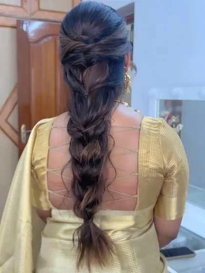 Another angle of the messy braid, showing the beautiful texture and movement in the hair.