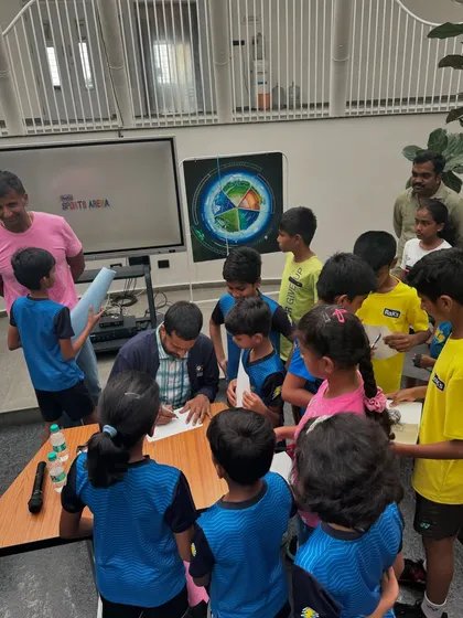 The future of badminton eagerly getting autographs from a legend. These moments of inspiration are what we cherish at Badminton Gurukul.