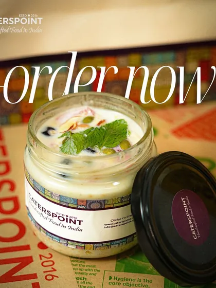 A simple, elegant shot of our fruit custard in its glass jar, ready to be ordered. It's a healthy and delicious dessert for any time of the day.