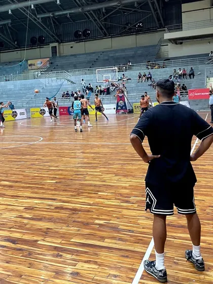 Watching my team from the sidelines during the tournament. A coach's job is to prepare them, then trust them to execute.