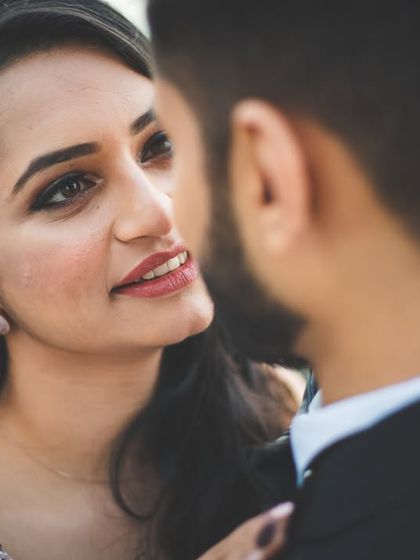 An intimate close-up of the bride looking at her groom. These shots capture the deep connection and love between a couple.