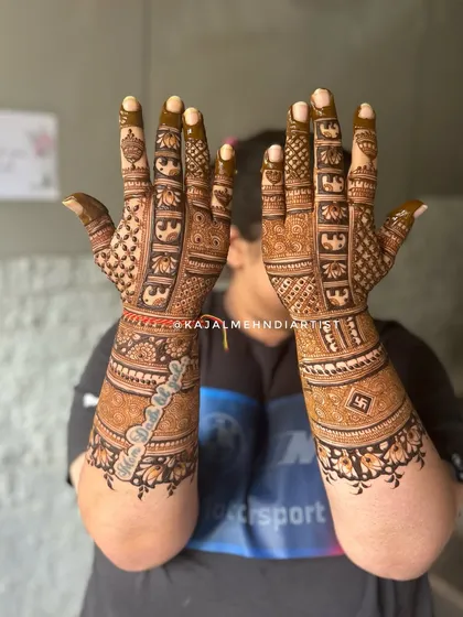 A heavy Indian backhand design with elephant motifs.