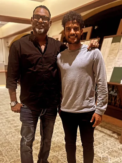 Our head coach with one of the team members. We foster a supportive environment built on mentorship and mutual respect between players and the coaching staff.