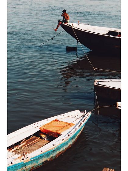 The same scene in color, with the blue of the boat adding a touch of vibrancy. It’s a reminder that if you ever find yourself in the wrong story, you have the power to leave.