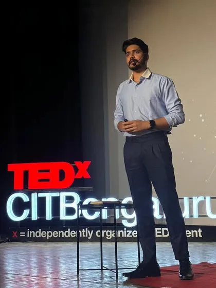 A shot of me speaking on the TEDx stage at CIT Bengaluru. My performances are more than just magic, they are motivational talks designed to inspire students to believe in the power of their own minds and potential.
