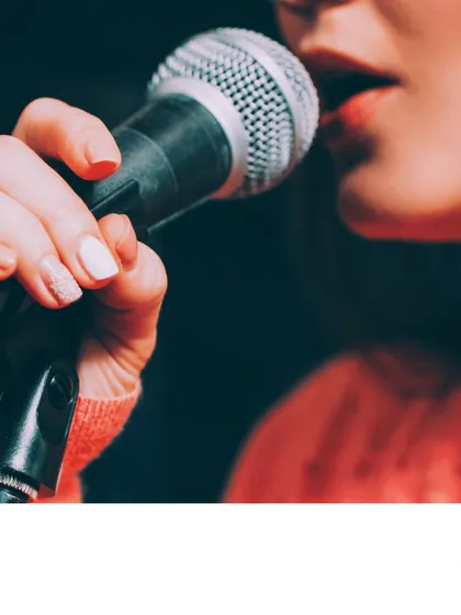 Proper microphone technique is a key part of modern vocal performance. Our lessons cover everything from fundamental breathing exercises to the practical skills needed for live and studio singing.