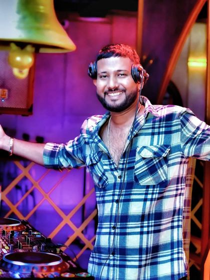 A happy moment behind the decks. Ask yourself what you want to do every day, and then do it.