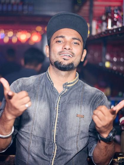 A dynamic shot from the console. My job is to entertain and create a vibe, and my expressions often show how much I'm into the music.