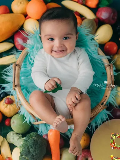 Another joyful smile from this sweet baby boy. These are the moments that make milestone sessions so special.