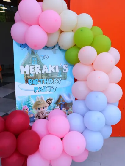The personalized welcome sign for Meraki's Labubu-themed birthday party, setting a whimsical tone for the event.