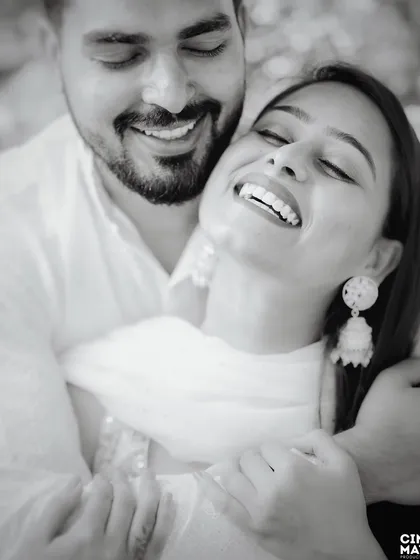 Sometimes, the most powerful emotions are captured without color. This black and white portrait focuses on pure joy and connection, creating a timeless piece of art that you will cherish forever.